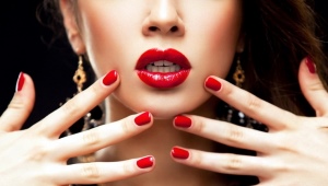 Manicure with red lacquer