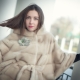 Stylish fur coat with a bat sleeve