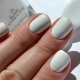 Manicure with white varnish